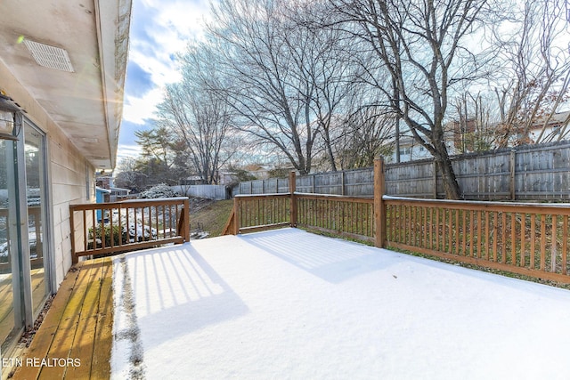 wooden deck featuring a fenced backyard