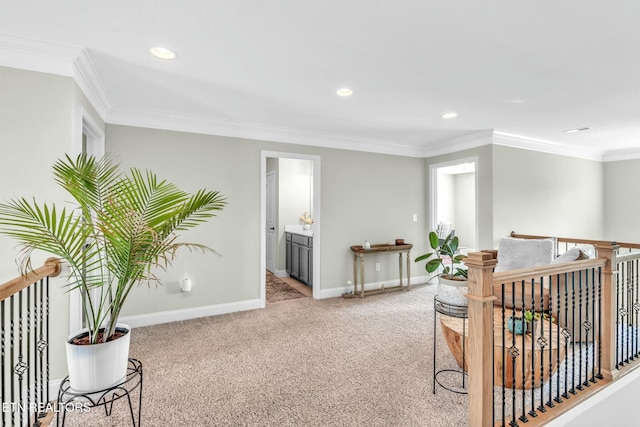 interior space with recessed lighting, ornamental molding, carpet flooring, an upstairs landing, and baseboards