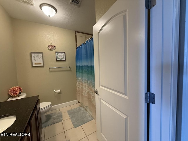 full bathroom with visible vents, toilet, a textured ceiling, vanity, and tile patterned floors