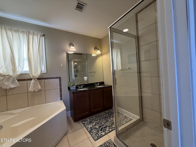 bathroom featuring a garden tub, tile patterned flooring, vanity, visible vents, and a stall shower