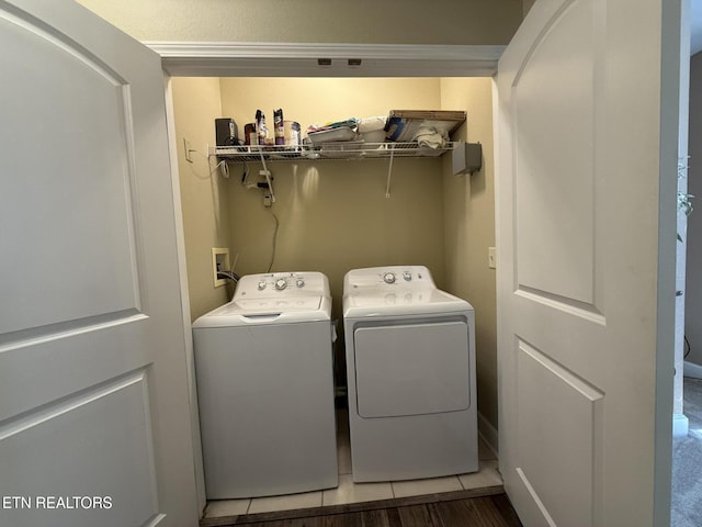 laundry area featuring laundry area and independent washer and dryer