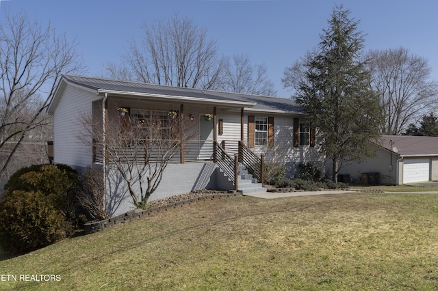 ranch-style house featuring a garage, a porch, metal roof, and a front lawn