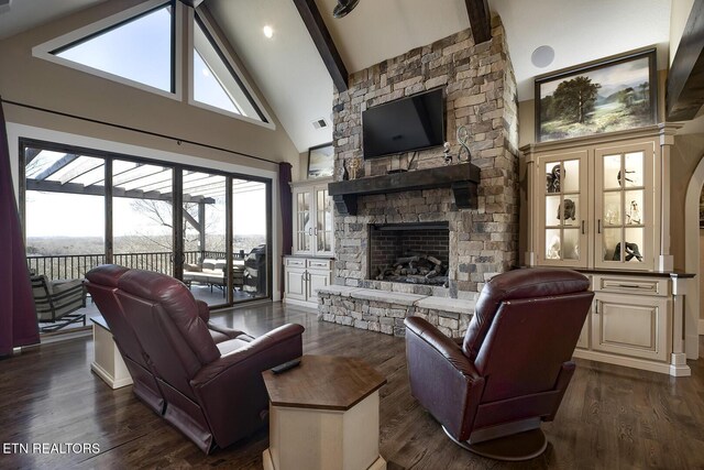245 Harrison Bend Rd, Loudon, TN 37774 - living area with visible vents, high vaulted ceiling, dark wood finished floors, beam ceiling, and a fireplace