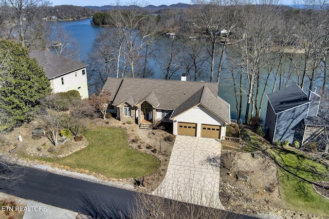 drone / aerial view featuring a water view