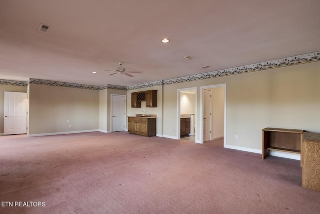 unfurnished bedroom featuring visible vents, baseboards, carpet flooring, and recessed lighting