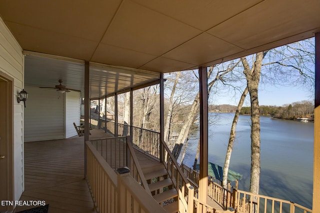 wooden terrace with a water view