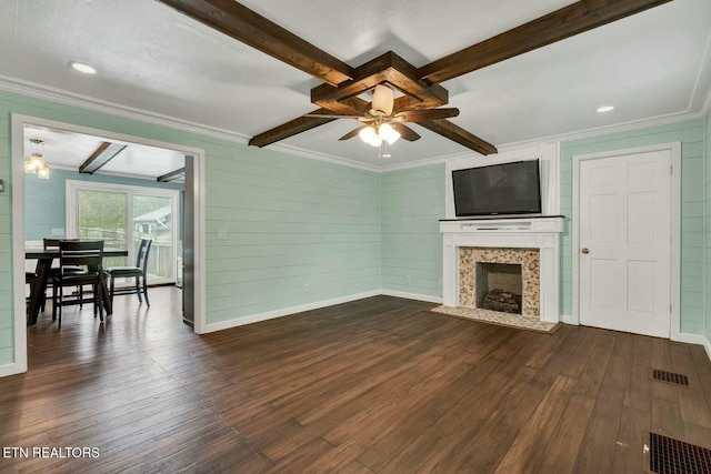 living room with dark wood finished floors, beamed ceiling, and a ceiling fan