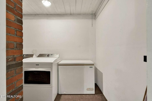 washroom with laundry area, wooden ceiling, and washing machine and clothes dryer