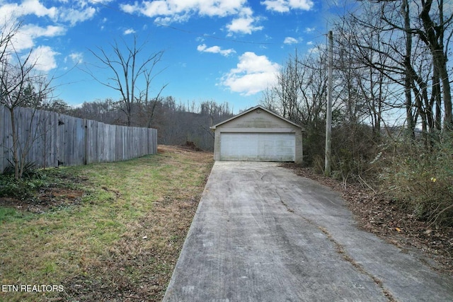 detached garage with fence