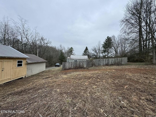 view of yard featuring fence