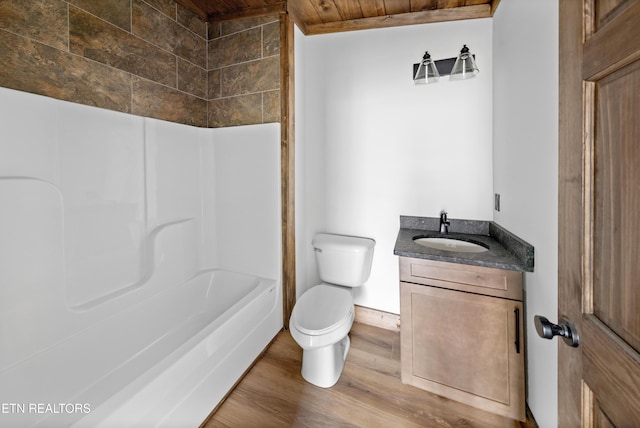 689 Country Oaks Ln, Lafollette, TN 37766 - bathroom featuring shower / washtub combination, toilet, vanity, wood finished floors, and wooden ceiling