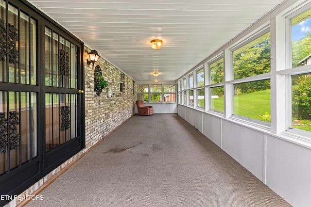 view of unfurnished sunroom