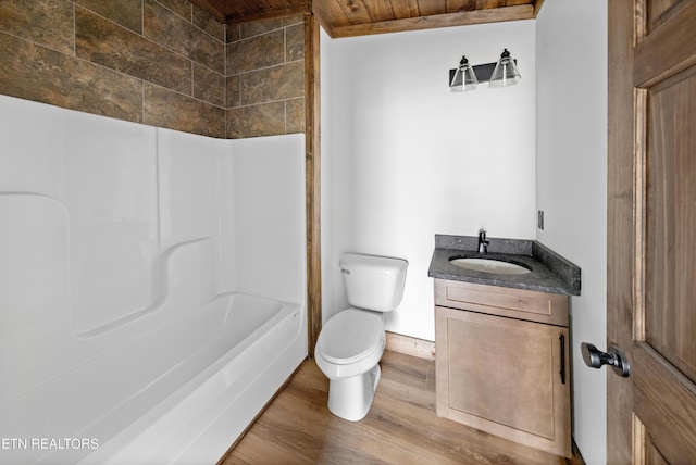 full bathroom with toilet, wood ceiling, tub / shower combination, vanity, and wood finished floors