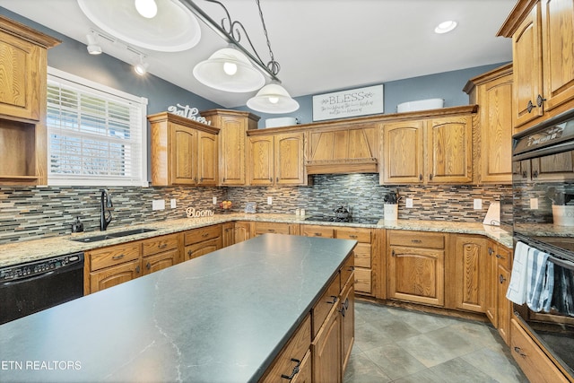 kitchen featuring a sink, custom range hood, black appliances, brown cabinetry, and pendant lighting