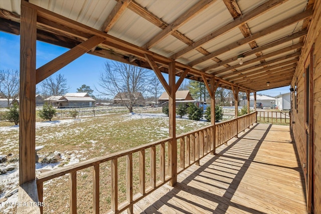 view of snow covered deck