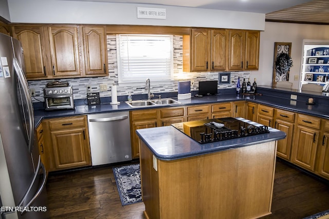 10 Dockside Dr, Crossville, TN 38558 - kitchen with dark countertops, brown cabinets, appliances with stainless steel finishes, and a sink