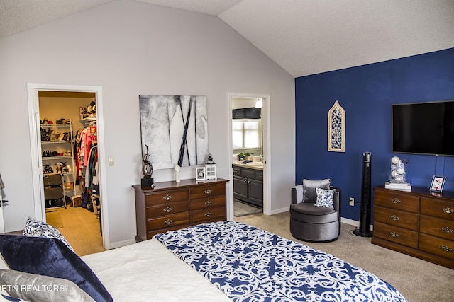 10 Dockside Dr, Crossville, TN 38558 - bedroom with a walk in closet, light carpet, lofted ceiling, a closet, and baseboards