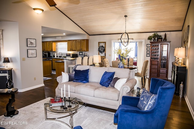 10 Dockside Dr, Crossville, TN 38558 - living area featuring dark wood finished floors, vaulted ceiling, and a healthy amount of sunlight