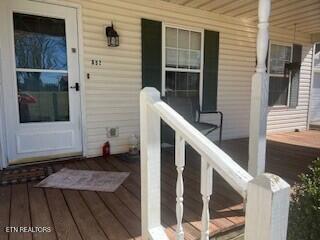 doorway to property featuring a porch