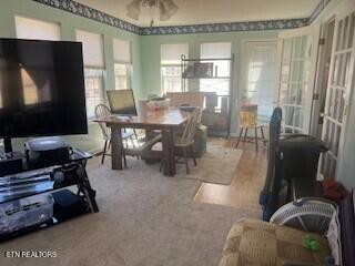 dining room featuring ceiling fan