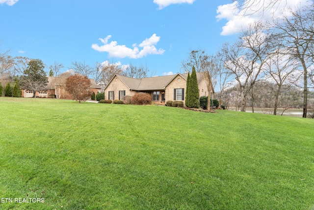 view of front facade with a front lawn