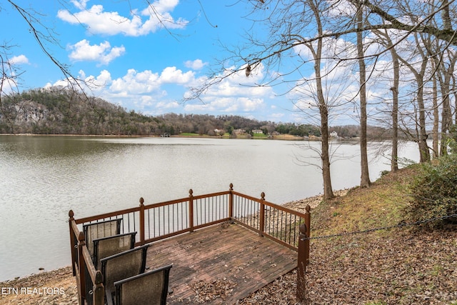 deck featuring a water view