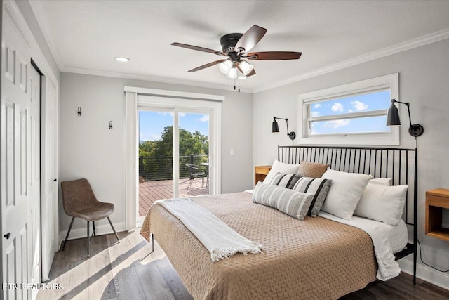 bedroom featuring access to exterior, multiple windows, and ornamental molding