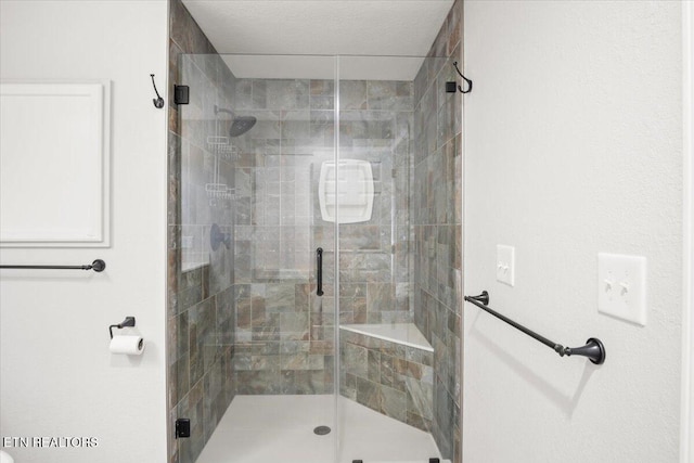 bathroom with a stall shower