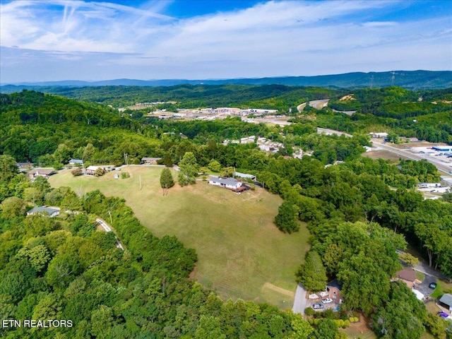 bird's eye view featuring a view of trees