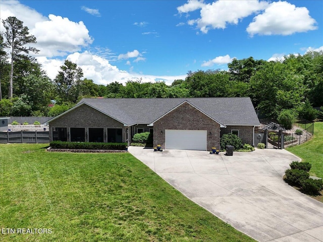846 Quietlands Dr, Maryville, TN 37801 - ranch-style home featuring driveway, a garage, and brick siding