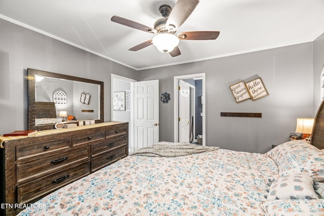 bedroom with ornamental molding and ceiling fan