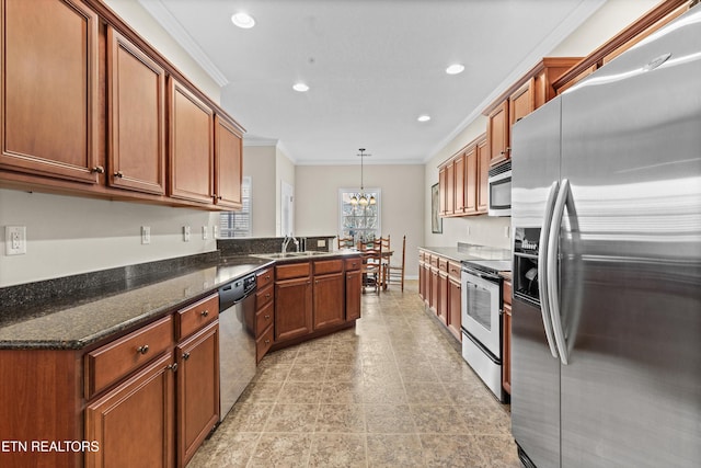 kitchen featuring a notable chandelier, recessed lighting, stainless steel appliances, brown cabinetry, and crown molding