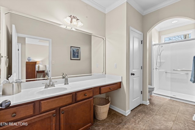 full bath featuring baseboards, toilet, crown molding, vanity, and a shower stall