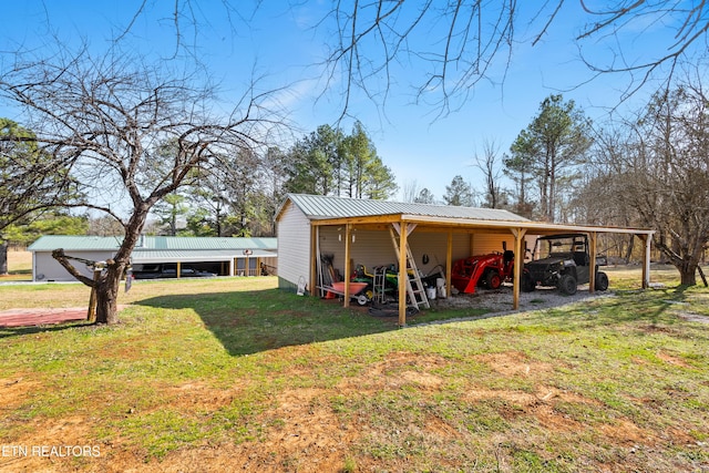 view of yard with an outbuilding and an outdoor structure