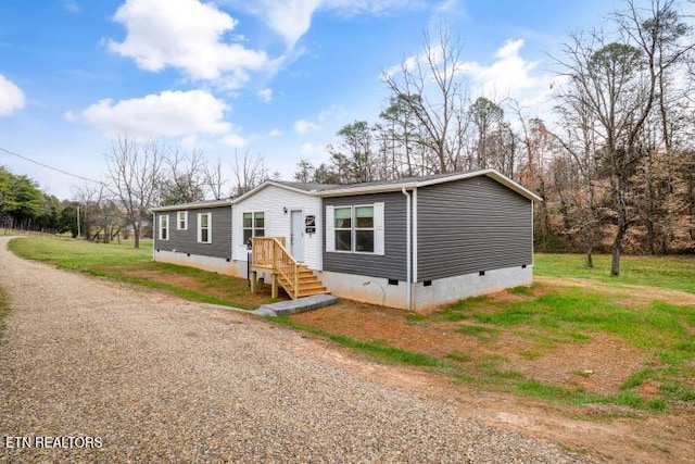 manufactured / mobile home with crawl space and driveway