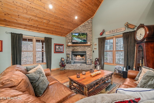 living room with high vaulted ceiling, a fireplace, wood finished floors, wood ceiling, and baseboards