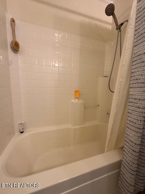 full bathroom featuring shower / tub combo