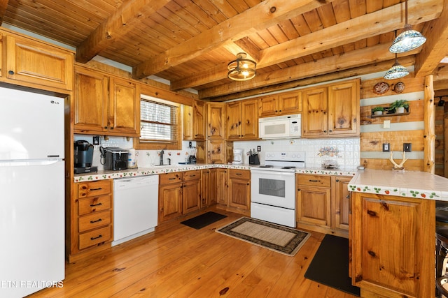 kitchen featuring white appliances, wood ceiling, light wood-style floors, light countertops, and decorative light fixtures