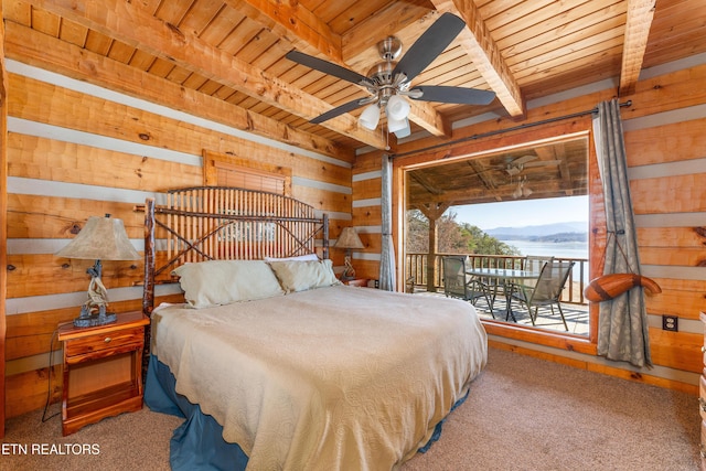 bedroom with access to outside, wooden ceiling, beamed ceiling, and wooden walls