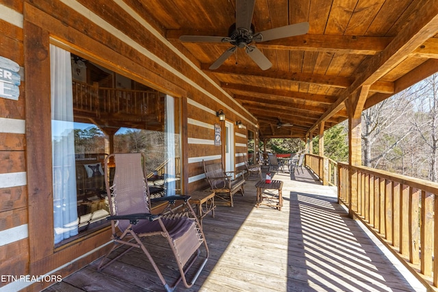 wooden deck with ceiling fan