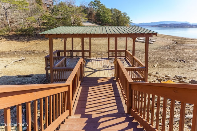 view of home's community featuring a gazebo and a water and mountain view