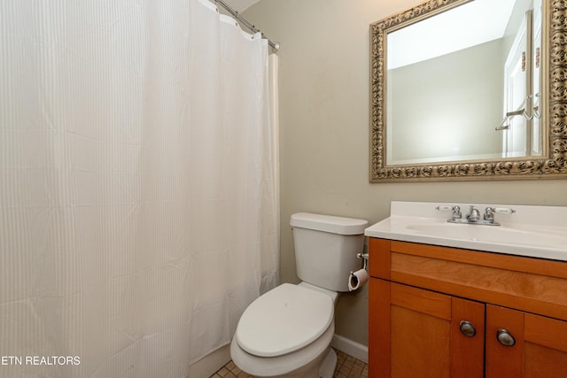 full bath with a shower with curtain, vanity, toilet, and tile patterned floors