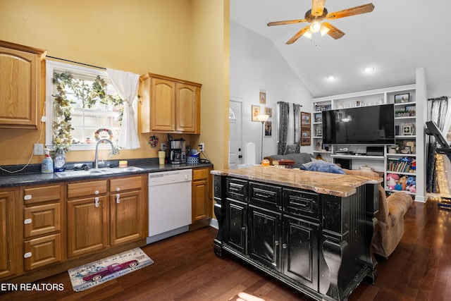 kitchen with dishwasher, ceiling fan, a kitchen island, dark wood-type flooring, and a sink