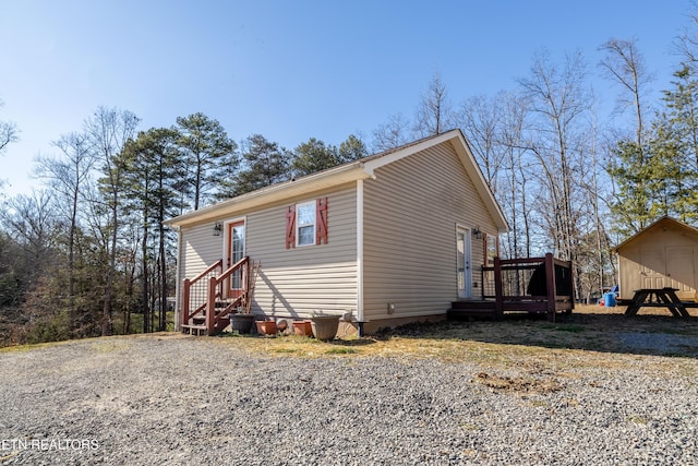 view of front of property featuring a wooden deck
