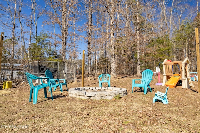 view of play area featuring a fire pit