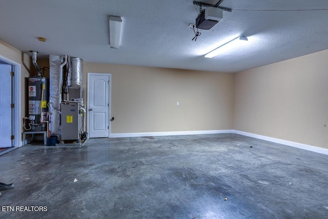 garage with baseboards, gas water heater, and a garage door opener
