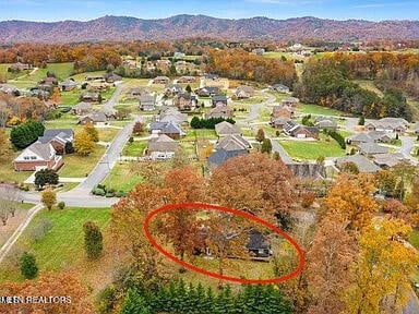 aerial view with a residential view and a mountain view