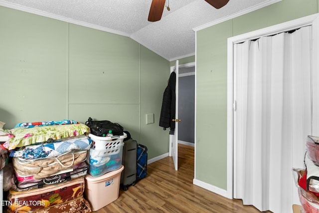 storage room featuring ceiling fan