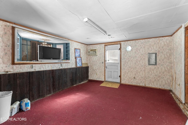 interior space with a wall unit AC, wallpapered walls, and wainscoting