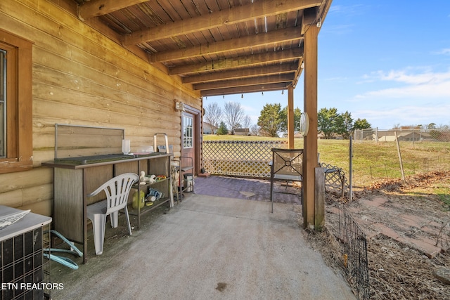 view of patio / terrace with cooling unit and fence